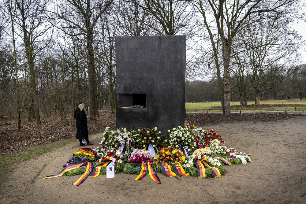 Note. By Maja Hitij, “Wreaths at the main memorial that commemorates homosexual victims of persecution by the Nazis in Berlin on Jan. 27.”
